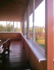 СТ "Холмы". Остекление террасы. «Холодное» остекление – алюминиевый профиль СИАЛ, белого цвета, заполнение - стекло 4мм.